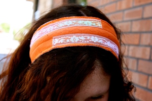 Plaidypus upcycled t-shirt headband - Orange with rainbow lace